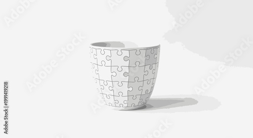 A puzzle cup sits on a white surface with a subtle shadow.