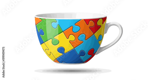 A colorful puzzle piece decorated teacup on a white table indoors closeup