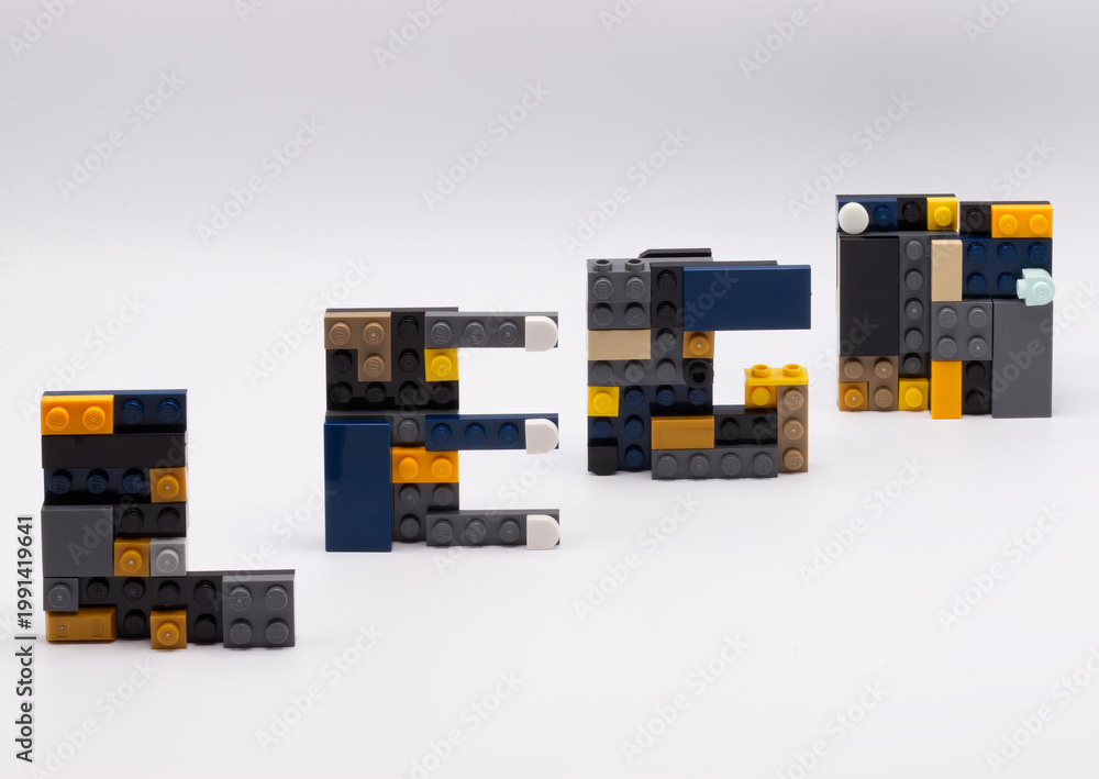 Fototapeta premium Bologna - Italy - April 14, 2026: Word Lego created from various plastic building blocks isolated on a plain white studio background.