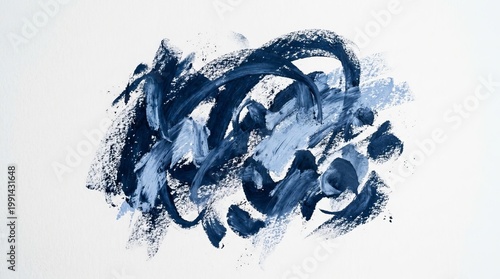 Abstract indigo brushstrokes evoke dynamic movement and artistic expression on a clean white background.