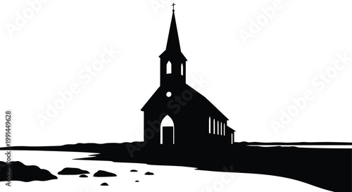 Silhouetted church with a steeple stands against a bright background