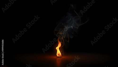 A small flame burns brightly on dark surface