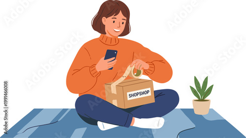 A woman sits cross-legged on a mat, holding a phone and opening a food delivery box.