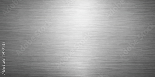 A polished stainless steel plate with a brushed metal texture creates a shiny silver metallic surface featuring a gray industrial pattern on a titanium sheet