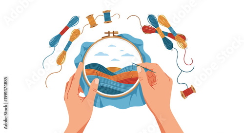 Top down view of hands embroidering a colorful landscape in a hoop surrounded by vibrant spools of embroidery thread.
