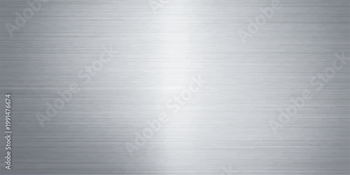 Polished silver stainless steel plate with a brushed metal texture featuring a shiny gray industrial aluminum surface and metallic pattern reflection for a professional material background