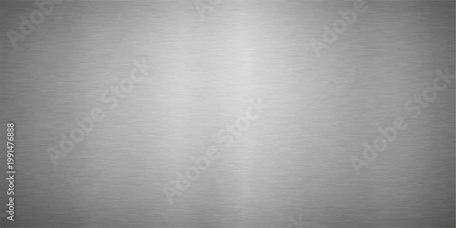 A polished silver stainless steel plate with an industrial brushed metal texture and a shiny grey metallic surface pattern creates a sleek aluminum alloy backdrop