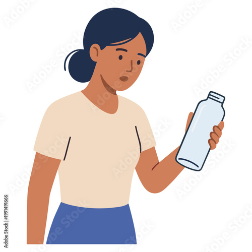 A woman examines a plastic water bottle in her hand closely.