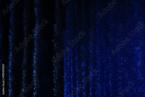 Schilderij op canvas fountain background, water jets of a multi-colored fountain changing color on a