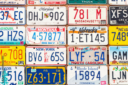 Old USA license plate collection on wall