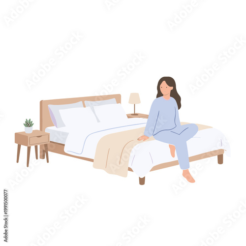 Woman sitting on bed in cozy bedroom with nightstand and lamp