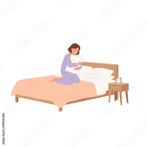 Woman sitting on bed with pillow in bedroom at night