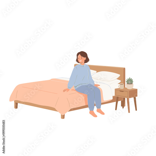 Woman sitting on a bed beside a nightstand in a cozy bedroom