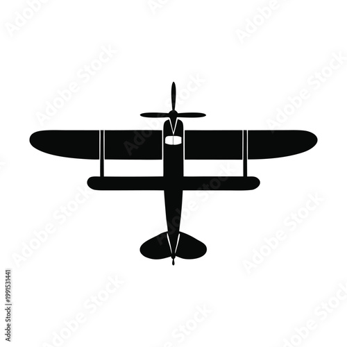 Vintage Airplane Silhouette: A high-angle monochrome view showcases the classic lines of a vintage airplane silhouette, evoking a sense of history and flight.