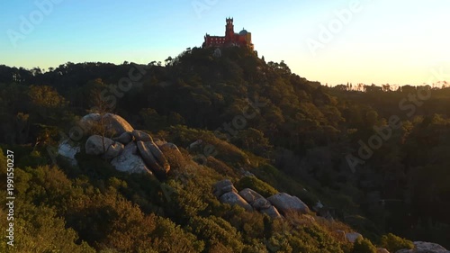 Romanticist Pena Palace Sitting on a Hill at Sunset in Sintra, Portugal