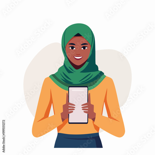 Woman in Hijab Holding a Tablet