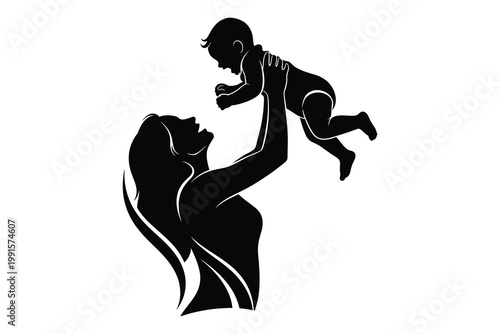 Silhouette of a woman lifting a baby up in the air playfully