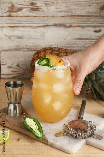 Female hand with glass of t...