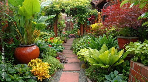Lush green foliage lines a narrow pathway leading through a vibrant outdoor garden space.