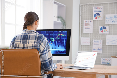 Female data scientist worki...