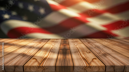 Empty rustic wooden table top with a blurred waving American flag in the background creating a patriotic presentation