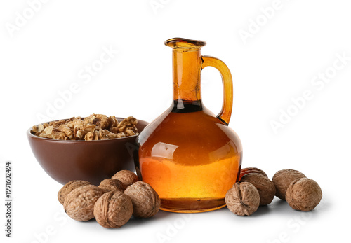 Bowl with tasty walnuts and...