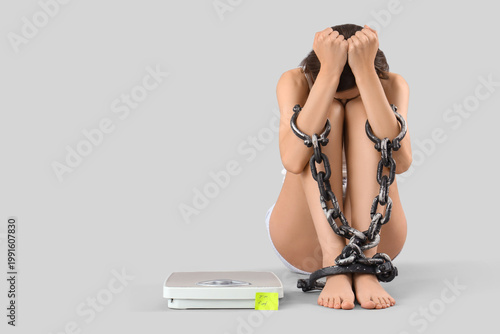 Stressed young woman with c...
