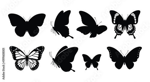 A collection of eight black and white butterfly silhouettes arranged neatly