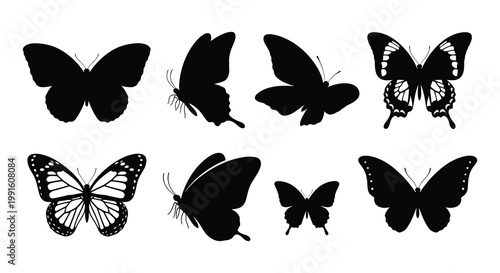 A collection of eight black and white butterfly silhouettes arranged neatly