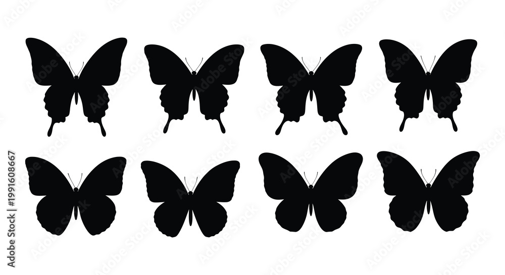 Obraz premium A collection of eight black and white butterfly silhouettes arranged neatly