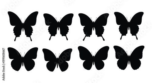 A collection of eight black and white butterfly silhouettes arranged neatly