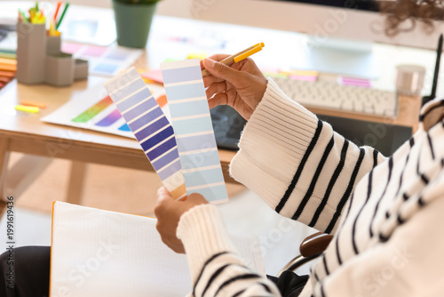 Female interior designer wi...
