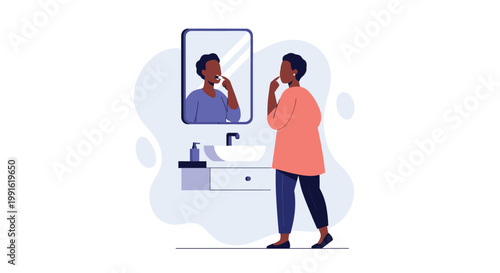 A person wearing a coral-colored shirt stands in a bright bathroom and carefully examines their teeth in a large rectangular mirror above a white sink.