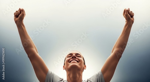A person with arms raised in joyful celebration looking upwards with a bright hopeful expression against a light background