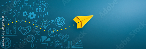 Yellow paper plane and business strategy on blue background, Business success, innovation and solution concept, copy space