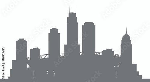 Skyscrapers form a detailed grey silhouette of a modern metropolitan city skyline standing against a clean white background for urban design projects.