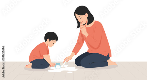 A patient mother and her young son kneel together on a light wooden floor while looking at a white puddle of spilled milk from a small tipped glass.