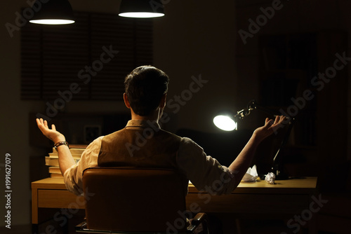 Young male writer with vint...