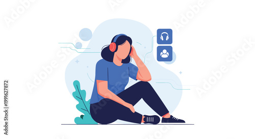 A relaxed woman wearing a blue shirt and dark pants sits on the floor while wearing red headphones and listening to music or a podcast on her device.