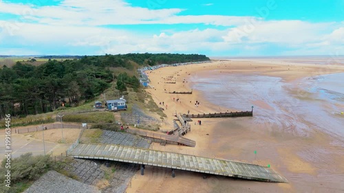 Wells Next to the Sea Beach. Sand dunes where Norfolk Coast path with beach huts and tourist beaches. Beach huts on the promenade at Gorleston-on-sea in Norfolk, UK