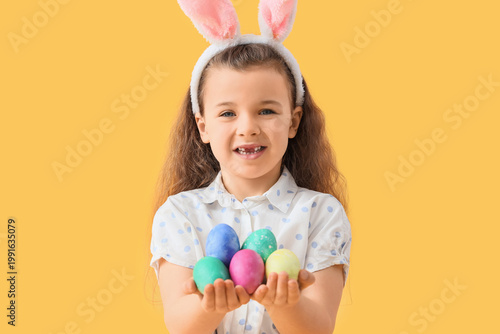Cute little girl in bunny e...