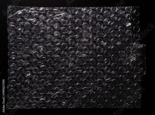 Bubble wrap texture on black background