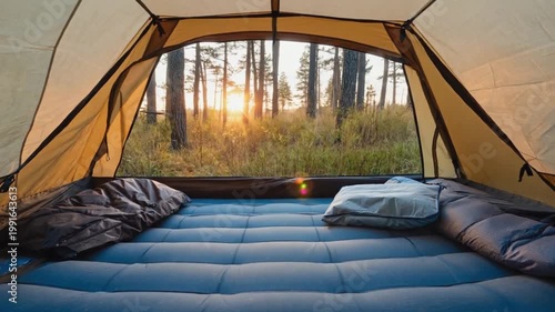 Interior of a tent in the morning in the forest.