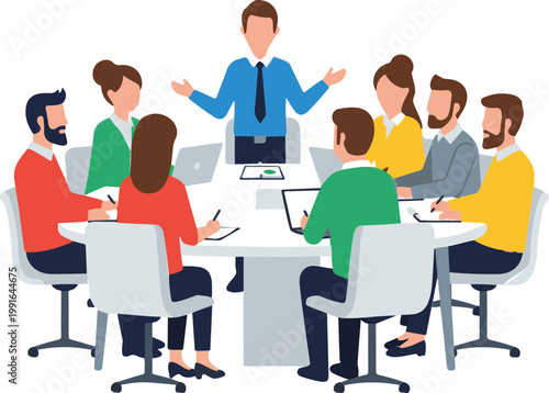 Business professionals gather around a conference table for an important meeting, with a presenter standing and discussing strategy with the team.