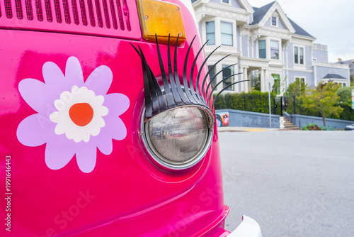 Photography Pink hippie van with eyelashes ornament in san francisco