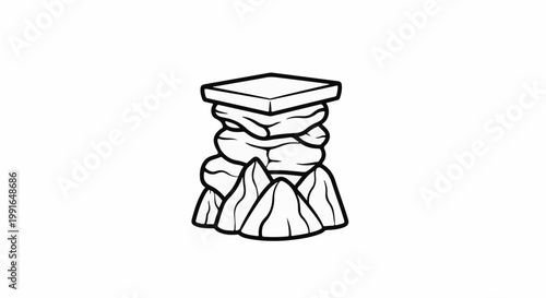 Stack of irregular stones topped with a flat square stone