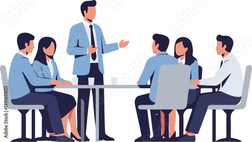 A professional business leader in a suit giving a presentation to a diverse team of colleagues seated at a modern meeting table.