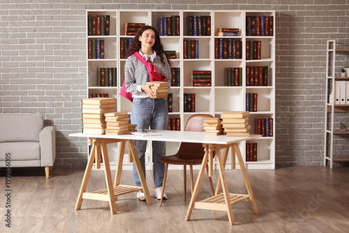 Female student with books i...