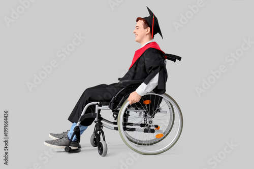 Male graduate in wheelchair...