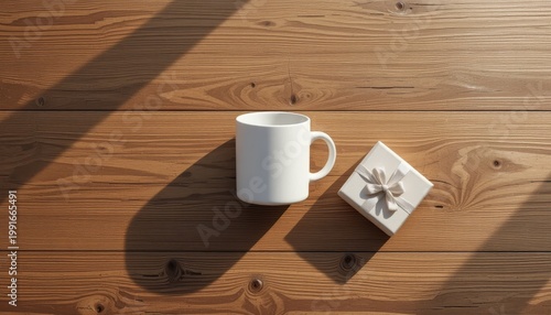 White Cup Next To A Gift Box On A Wooden Table With Long Shadows And Gentle Morning Light